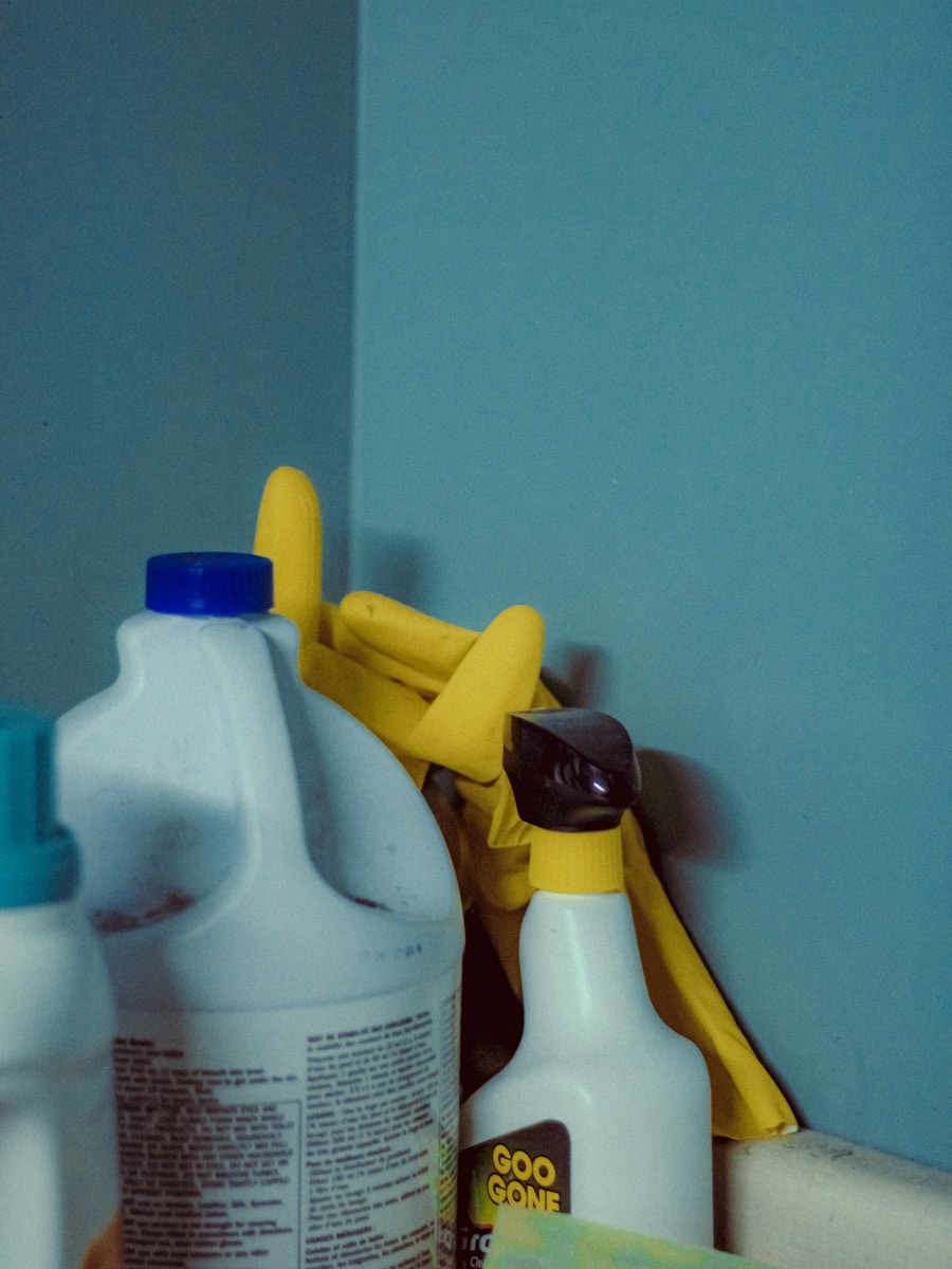 A close up of a bottle of cleaner next to a mirror