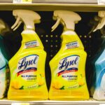 several bottles of lysol all purpose cleaner on a shelf